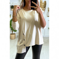 Pull beige pour femme très doux avec oeillets et attaches sur les cotés.