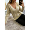 Pull beige tombant et col V avec boutons aux manches