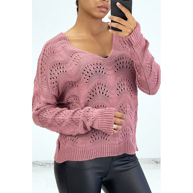 Pull fushia en maille côtelé avec motifs géométriques et manches oversize