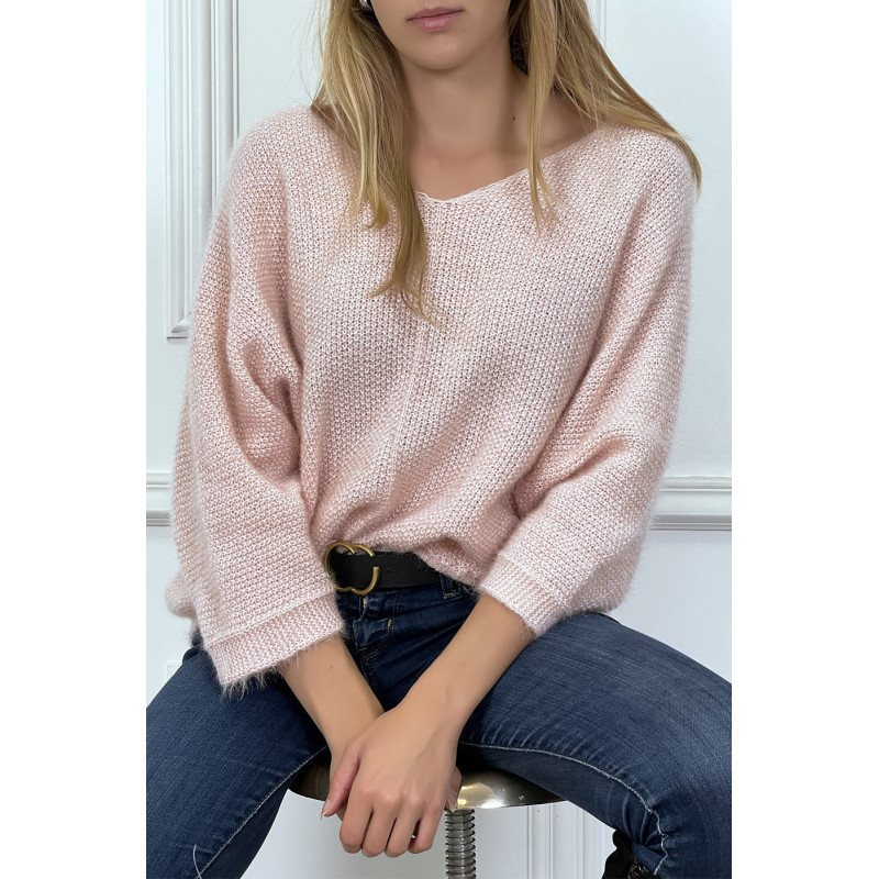 Pull rose over size et tombant composé de laine