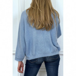 Pull turquoise over size et tombant composé de laine