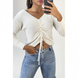 Pull beige col V avec lacet...