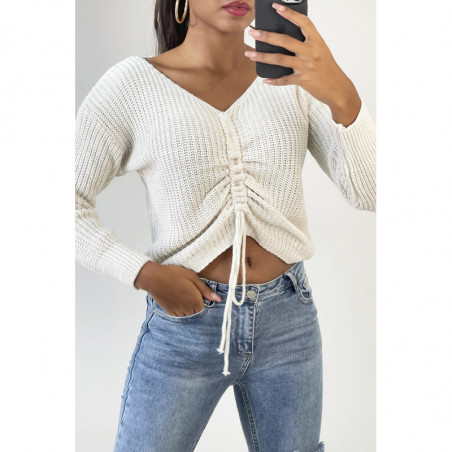 Pull beige col V avec lacet réglable à l'avant