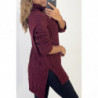 Pull femme bordeaux long over size avec fente sur les côtés.