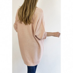 Pull rose long col V ample effet maille avec détail tricot de ligne en relief qui restructure la silhouette