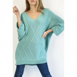 Pull turquoise long col V ample effet maille avec détail tricot de ligne en relief qui restructure la silhouette