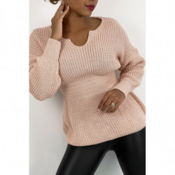 Pull mi-long rose effet maille avec col plongeant cintré à la taille et manche ample serrée au poignet