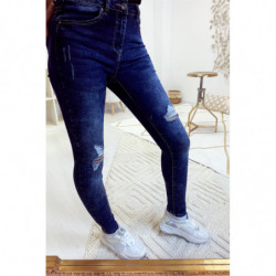 Jeans slim bleu foncé délave et déchiré aux genoux A1016