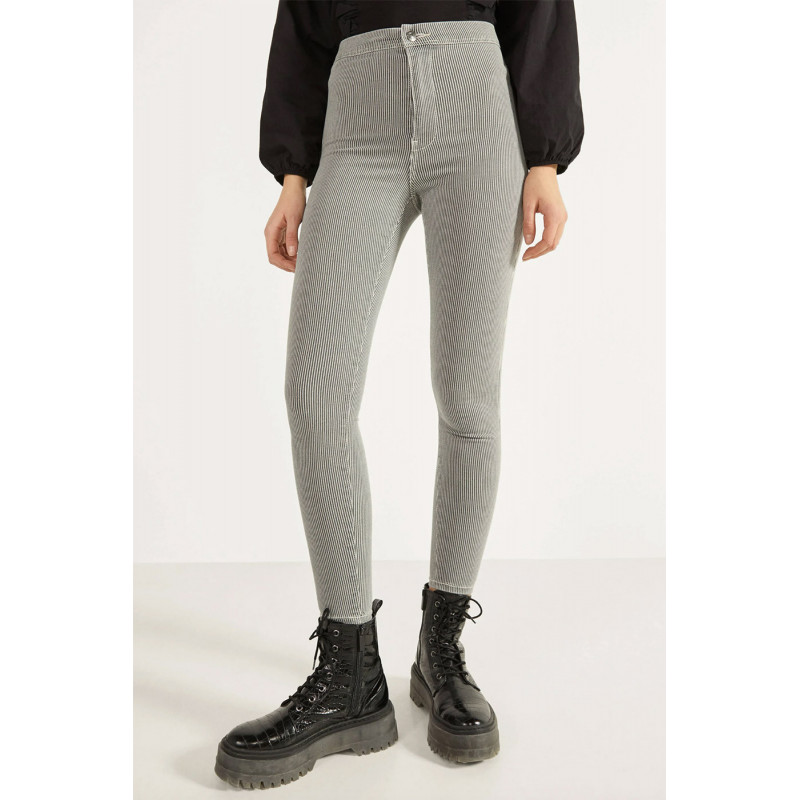 Jeggings noir et blanc rayé avec poches arrières