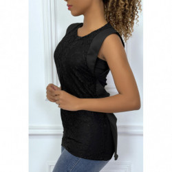 Haut asymétrique noir à col rond et motif ajouré