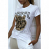 Tee-shirt blanc cintrée avec écriture REBEL et tête de lion