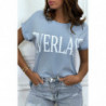 T-shirt turquoise manches retroussées avec écriture "Everlast".