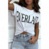 T-shirt blanc manches retroussées avec écriture "Everlast".