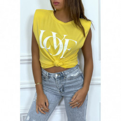 T-shirt sans manches jaune à épaulettes et écriture "love"