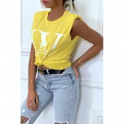 T-shirt jaune avec épaulettes et écriture W. T-shirt femme en coton