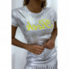 T-shirt blanc écriture  "Rock" en jaune effet serpent