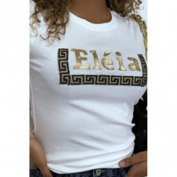 T-shirt blanc manches courtes, avec écriture dorée "Eléia" et imprimés