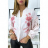 Chemise rose avec manches bouffante et broderie devant