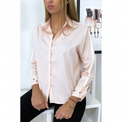 Chemise rose à perles sur les manches