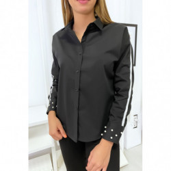 Chemise noir avec bande blanche sur les bras et perles aux manches