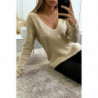 Pull beige tombant et col V avec boutons aux manches