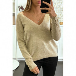 Pull beige tombant et col V avec boutons aux manches