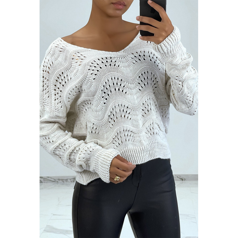 Pull beige en maille côtelé avec motifs géométriques et manches oversize