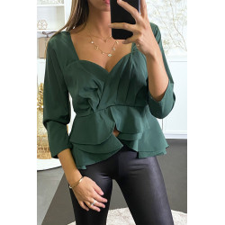 Blouse verte péplum à col et dos plongeant. - 1